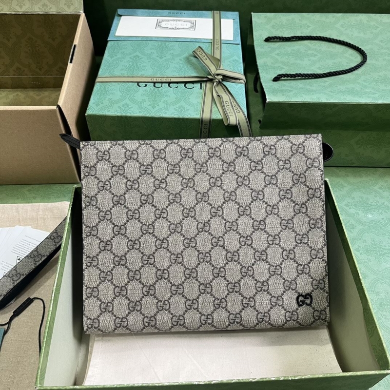 G*u*i clutch bags